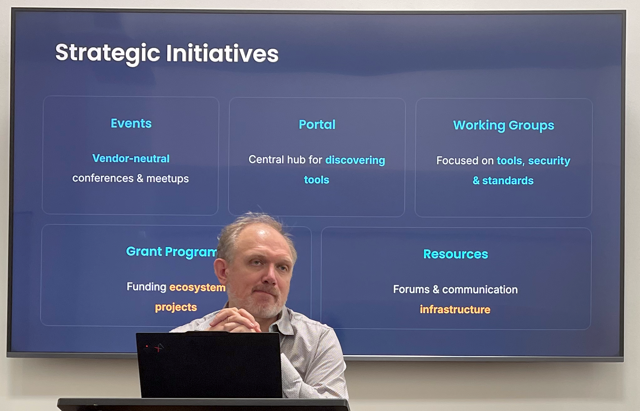 Vadmin in front of a slide talking about goals